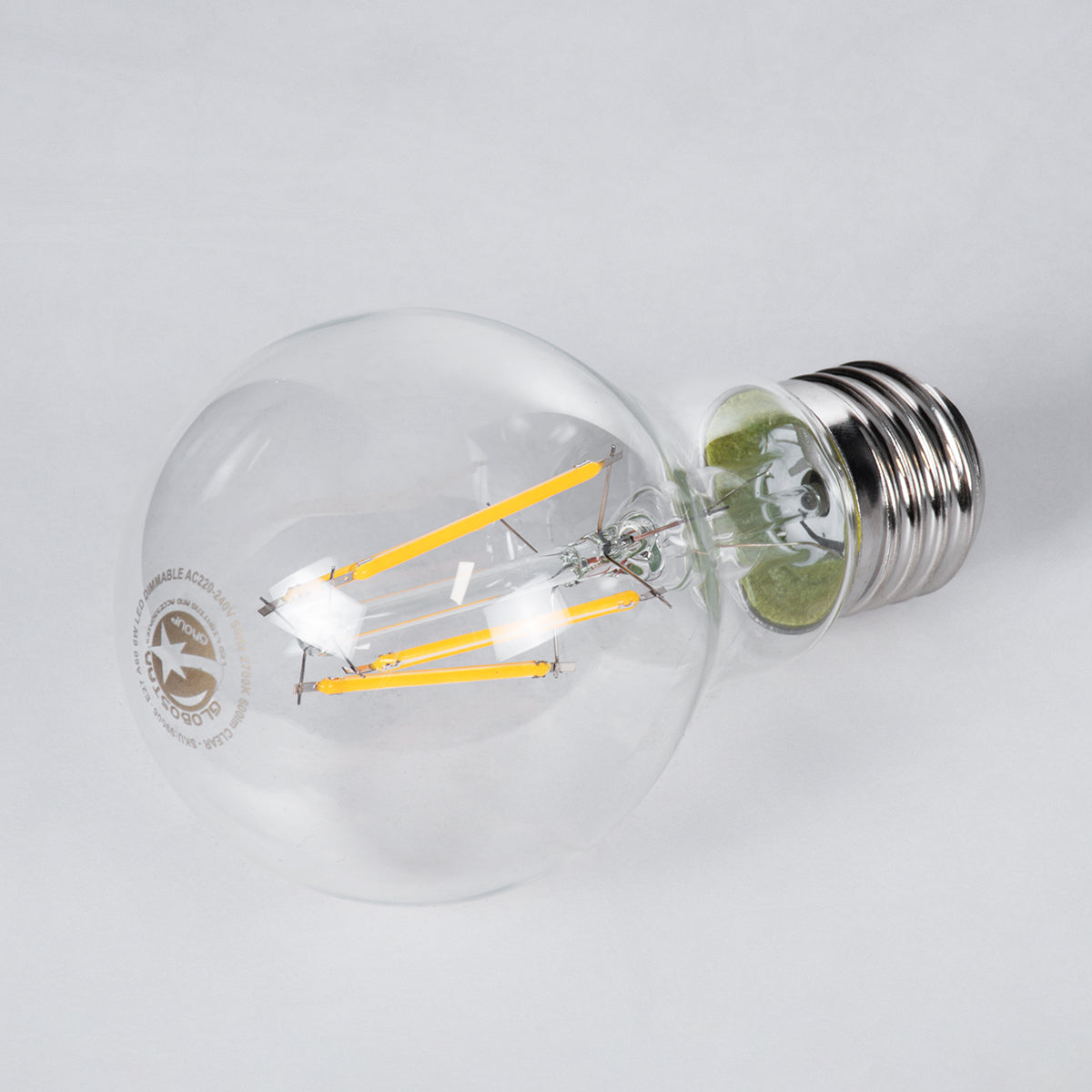 99006 Λάμπα LED Long Filament E27 A60 Γλόμπος 6W 600lm 360° AC 220-240V IP20 Φ6 x Υ10.5cm Θερμό Λευκό 2700K με Διάφανο Γυαλί - Dimmable